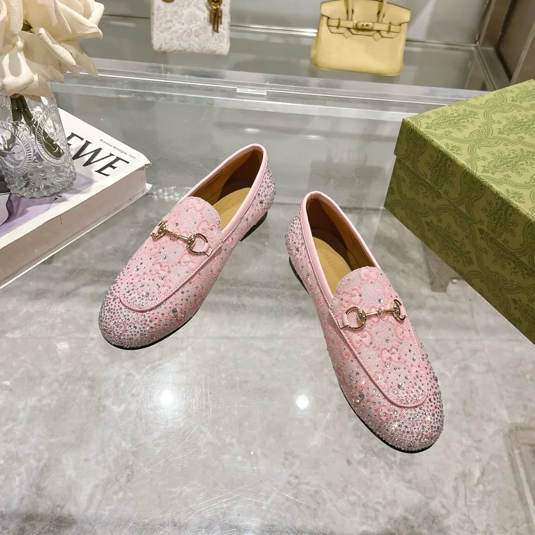 👟👟Ex-factory price 500👟👟 Genuine leather sole +50 (35-41) (41/42 customized) As an outstanding representative of Gucci’s design heritage, the Jordaan series of loafers with horsebit buckles vividly highlight the classic and elegant style. Crafted from the brand's signature monogram canvas, this shoe is timeless. Made from soft material and with a refined, smooth silhouette, these shoes are a perfect expression of everyday elegance. Gucci Angora Red GG Canvas Women Light Gold Tone Hardware Horsebit Faceted Crystal Detail Leather Sole Flat.